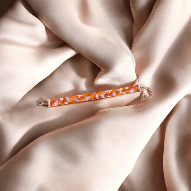 Bracelet léopard tons rose et orange